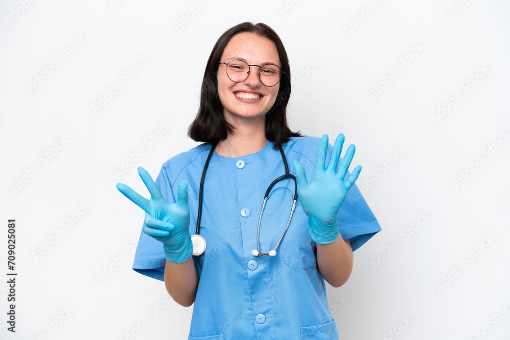 Young nurse caucasian woman isolated on white background counting eight with fingers Young nurse caucasian woman isolated on white background counting eight with fingers