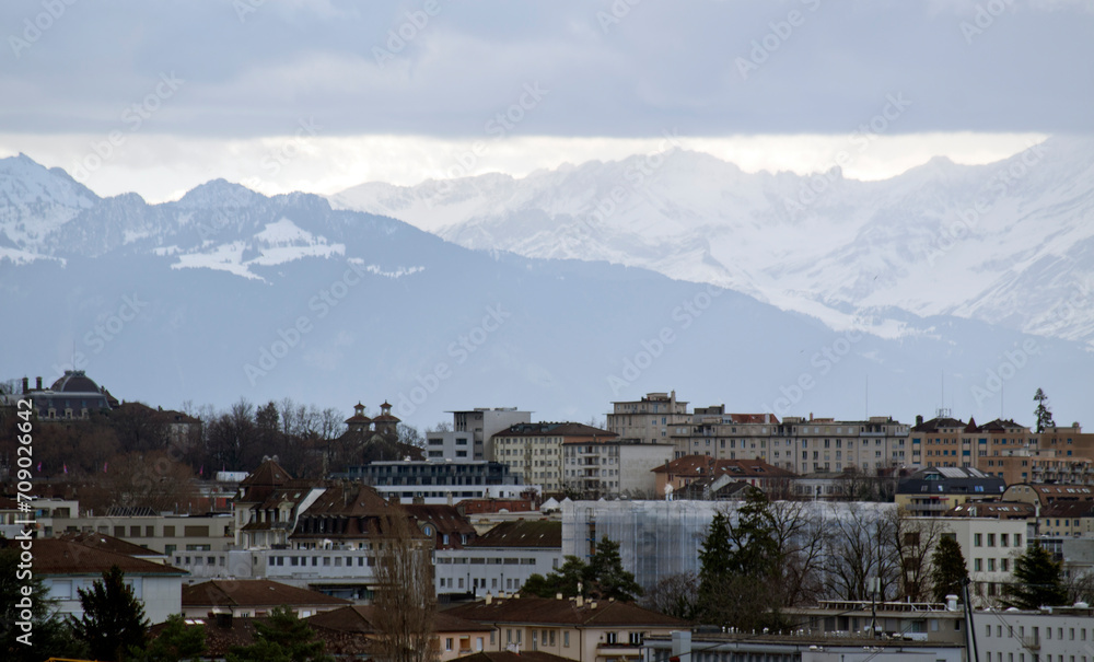 Lausanne Switzerland, cityscape and snowy alps