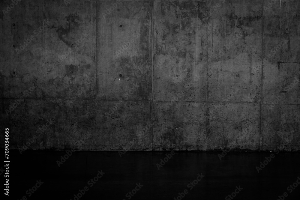 Grungy dark concrete wall and wet floor Grungy dark concrete wall and wet floor