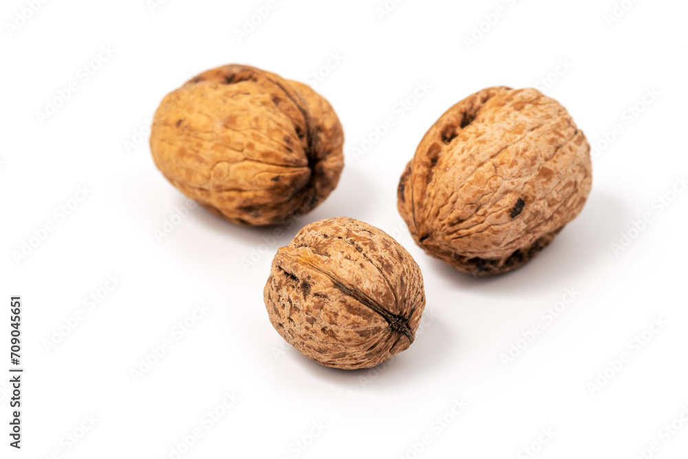 Delicious whole walnuts, isolated on white background Delicious whole walnuts, isolated on white background