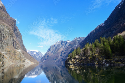 Symmetrical reflections of the fjord, view from Gudvangen