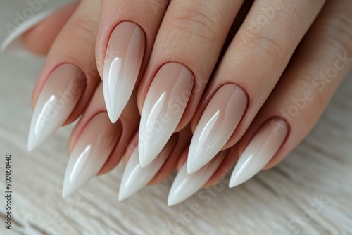 close up of long nails with french manicure