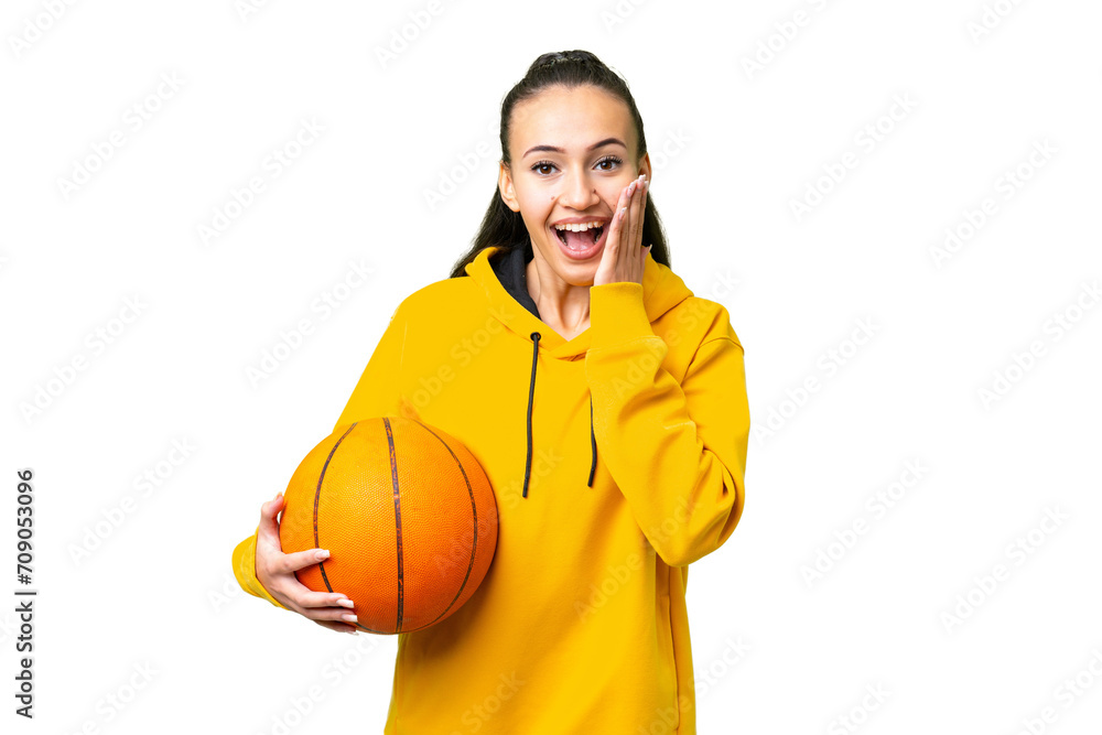 Young Arabian woman playing basketball over isolated wall over isolated chroma key background with surprise and shocked facial expression Young Arabian woman playing basketball over isolated wall over isolated chroma key background with surprise and shocked facial expression