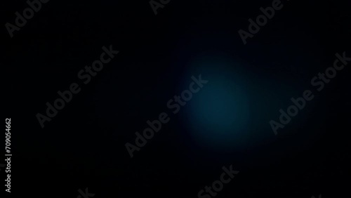 Glass light lens flare light leaks overlay on a black background photo