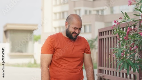Bald indian Man Feeling Shy