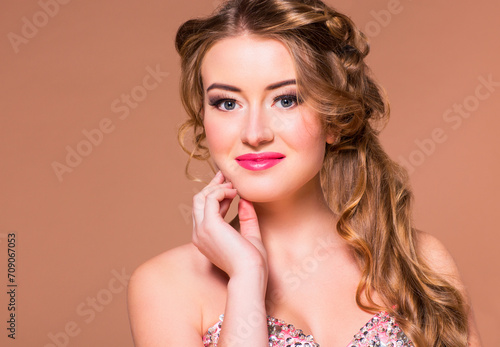 Portrait young beautiful blond woman with long hairdress