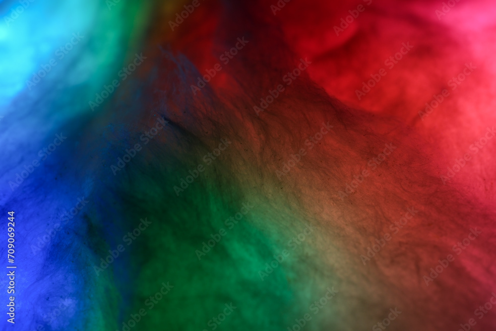 abstract closeup photo of cotton candy on multicolor light abstract closeup photo of cotton candy on multicolor light