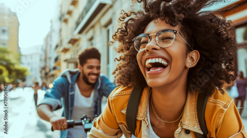 A lively group of young adults cycling through a bustling city street, enjoying the urban landscape and each other's company