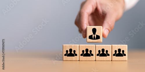 Organization and team structure symbolized with cubes, leadership manager team of company, business organizational hierarchy job concept, president job change control photo