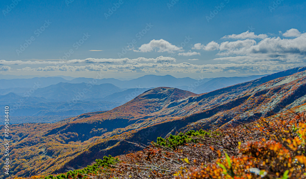 Fototapeta premium landscape of mountains and blue sky with clouds