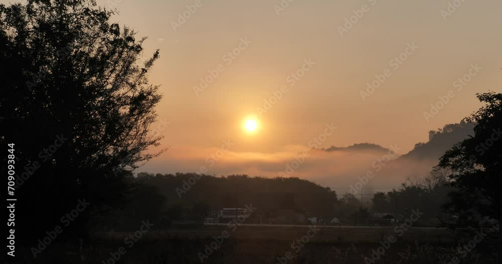 Landscape during sunrise and morning mist covering the countryside, beautiful mist cover, cloud cover Landscape during sunrise and morning mist covering the countryside, beautiful mist cover, cloud cover