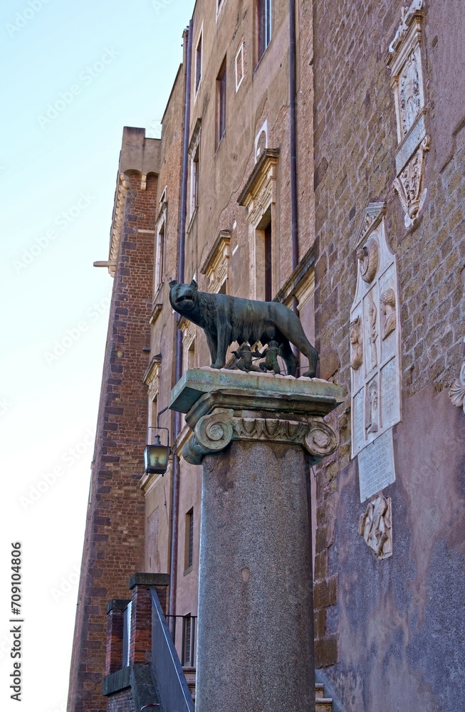 Ancient roman bronze statue of a she-wolf feeding Romulus and Remus the traditional founders of the city and empire of Rome, Italy Ancient roman bronze statue of a she-wolf feeding Romulus and Remus the traditional founders of the city and empire of Rome, Italy