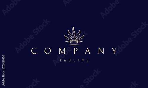 A vector golden logo with an abstract image of cannabis leaves in the form of a blazing fire.