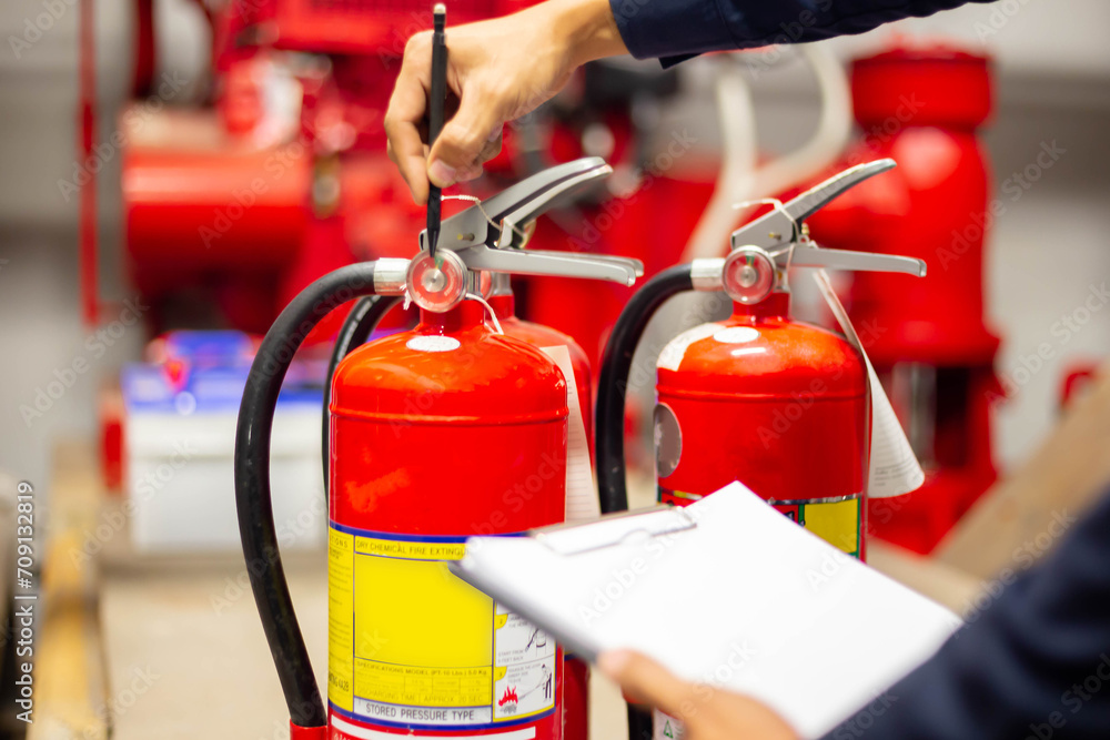 Engineer checking Industrial fire control system,Fire Alarm controller, Fire notifier, Anti fire.System ready In the event of a fire. Engineer checking Industrial fire control system,Fire Alarm controller, Fire notifier, Anti fire.System ready In the event of a fire.