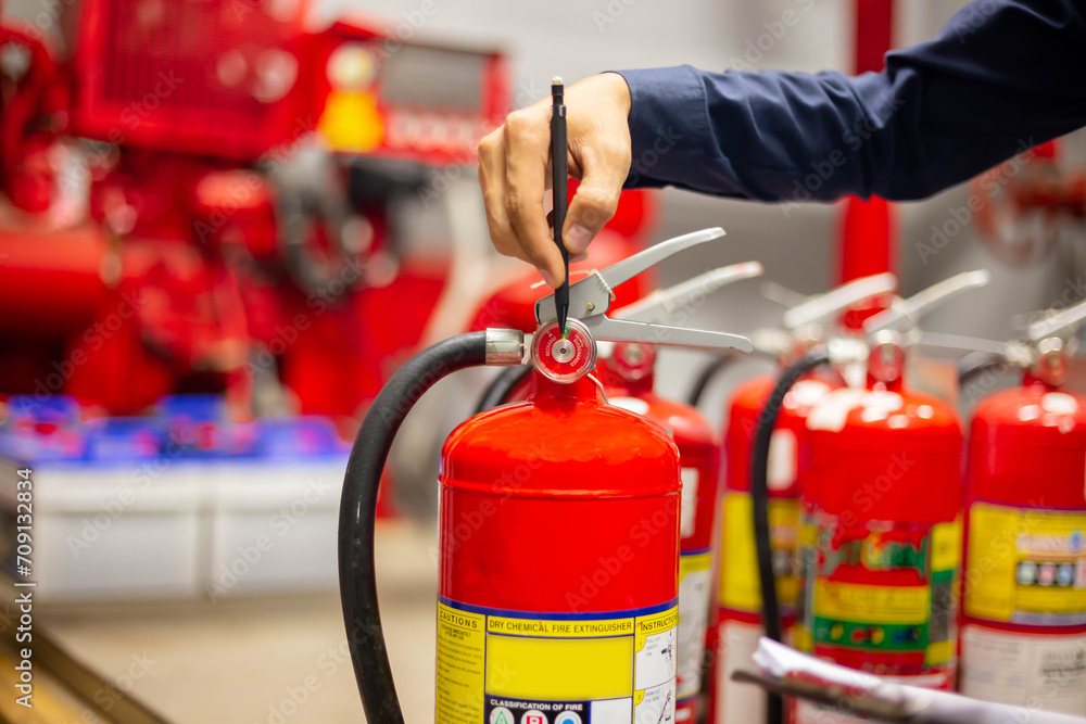Engineer checking Industrial fire control system,Fire Alarm controller, Fire notifier, Anti fire.System ready In the event of a fire. Engineer checking Industrial fire control system,Fire Alarm controller, Fire notifier, Anti fire.System ready In the event of a fire.