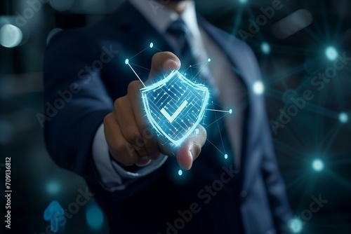 Close up detail of a business man holding a digital hologram of light blue compliance "tick" symbol © World of AI