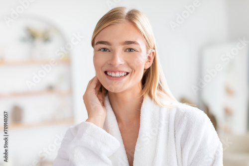 Free Download pretty blonde lady in white bathrobe posing at bathroom indoors - GFXLoad