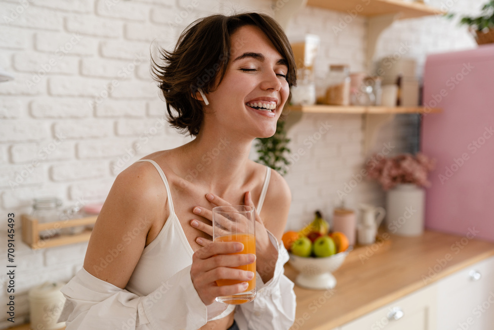 young pretty woman cooking at home, morning kitchen, healthy food young pretty woman cooking at home, morning kitchen, healthy food