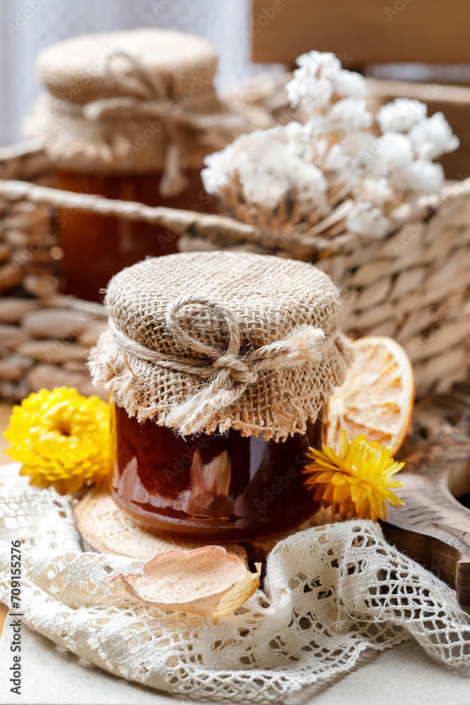 Jar of honey on wooden table. Jar of honey on wooden table.