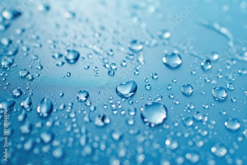 Macro Close-Up of Water Drops on Blue Background with Copy Space