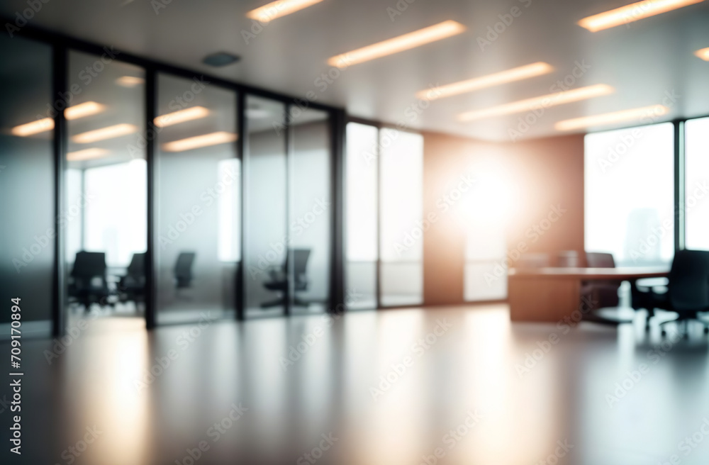 Blurred empty modern office. Defocused abstract light bokeh business open space interior background for design. Corporate strategy, finance, operations, marketing. Blur focus of tables with computers Blurred empty modern office. Defocused abstract light bokeh business open space interior background for design. Corporate strategy, finance, operations, marketing. Blur focus of tables with computers