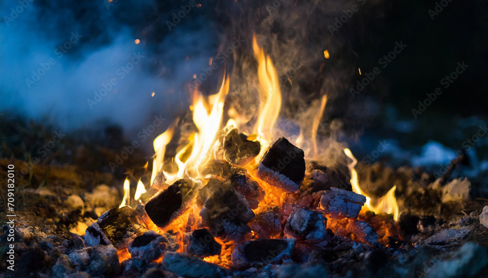 Embers glow in the night, a symbol of fading warmth. Extinguished fire against a tranquil sunset, capturing the essence of serenity and quiet moments Embers glow in the night, a symbol of fading warmth. Extinguished fire against a tranquil sunset, capturing the essence of serenity and quiet moments