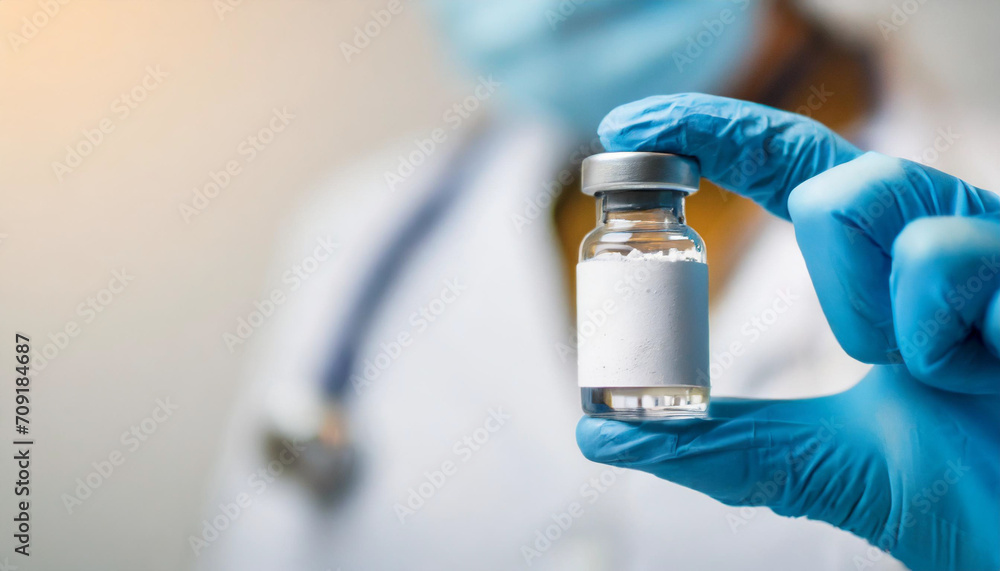 Vial of vaccine with drug powder on white background; symbolizing hope, health, and scientific progress with copy space for informative captions