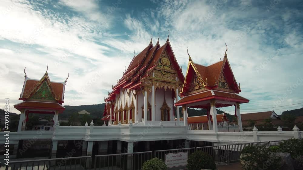 Buddhist temple in Phuket Thailand, blue sky and scenic clouds in the background