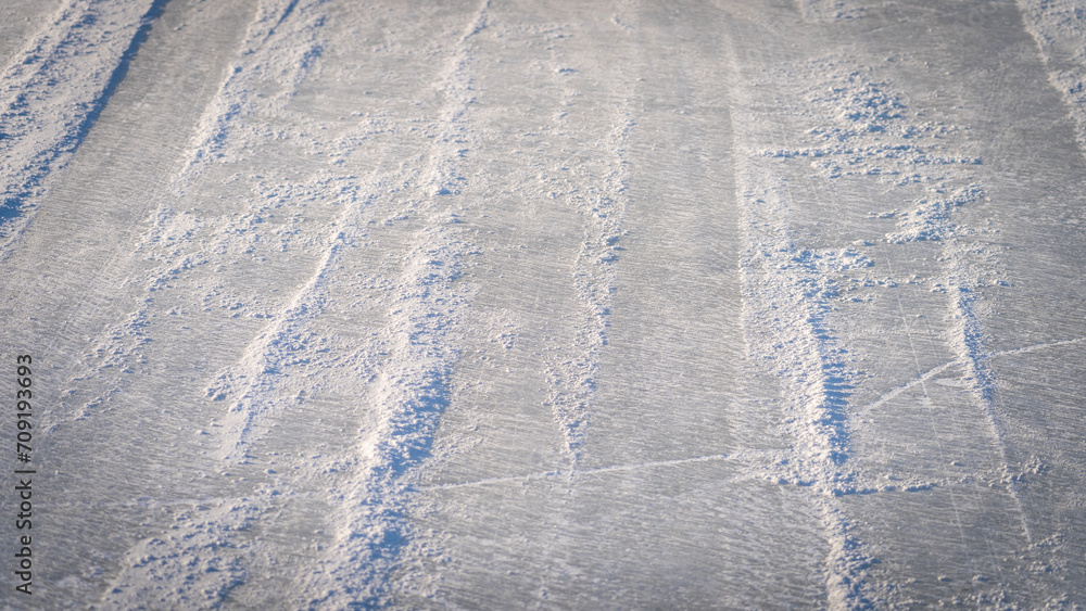 Road on Ice, Ice Breaker for Cars, Car tracks on ice, Background image, stub for design, selective focusing Road on Ice, Ice Breaker for Cars, Car tracks on ice, Background image, stub for design, selective focusing