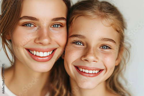 Radiant Smiles: Mother-Daughter Duo