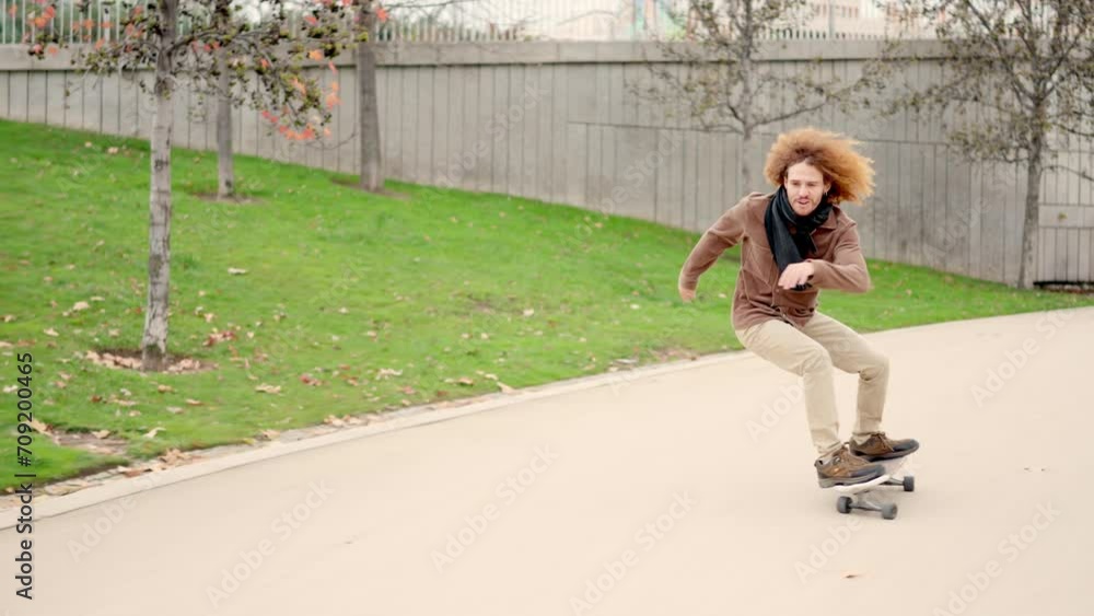 Alternative young man skateboarding in a n urban park Alternative young man skateboarding in a n urban park