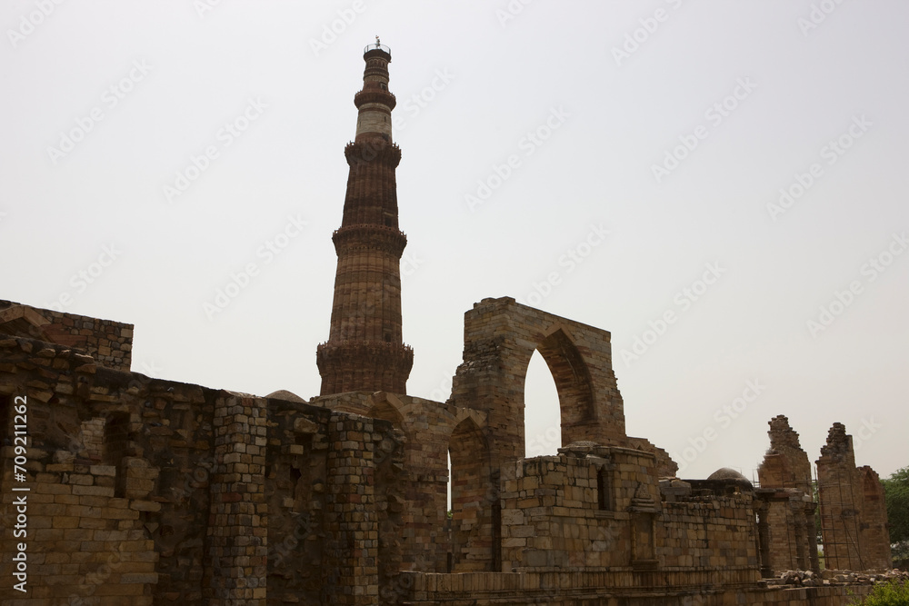 India Delhi Qutub Minar on a sunny autumn day