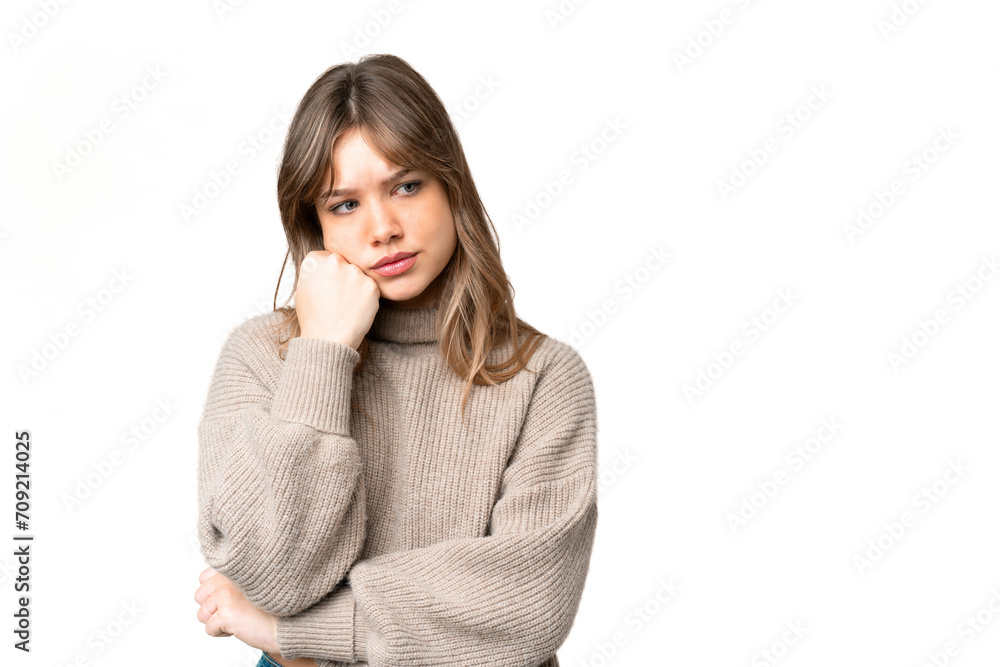 Young girl over isolated chroma key background with tired and bored expression Young girl over isolated chroma key background with tired and bored expression