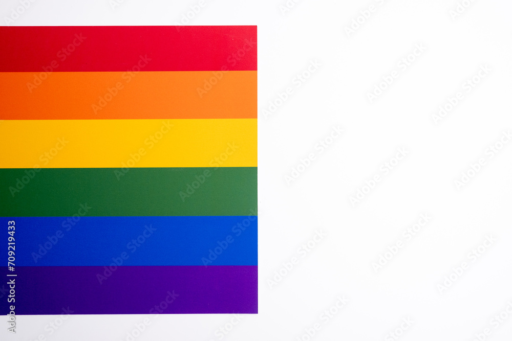 Rainbow flag on a light background. LGBT flag. LGBTQIA Pride Month in June. Lesbian-gay-bisexual-transgender. Gender equality. Human rights and tolerance. Rainbow flag
