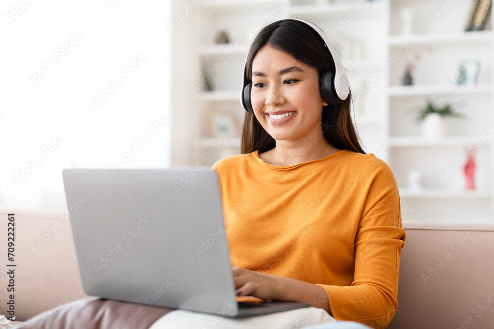 Happy young asian woman working from home Happy young asian woman working from home