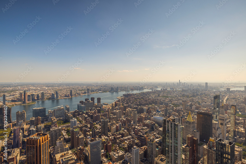 A bird's-eye view of the Manhattan skyline, featuring the Hudson River and skyscrapers. New York. USA.