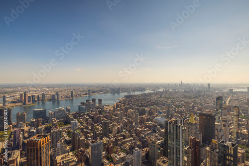 A bird's-eye view of the Manhattan skyline, featuring the Hudson River and skyscrapers. New York. USA. © Alex