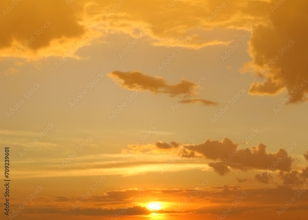 Fototapeta premium sunset in the sky. sunset sky with clouds. orange sky during sunset.