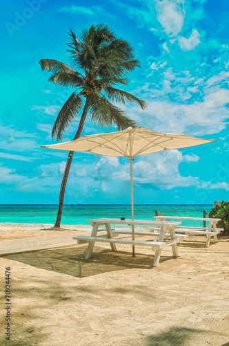 Beach chairs  umbrella on the sandy beach near the sea. Summer holiday