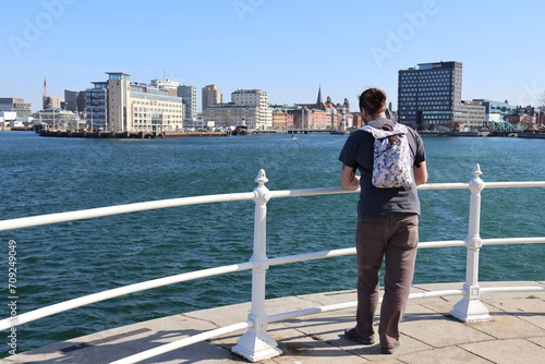 Man looking at Malmö from the little lighthouse, Sweden