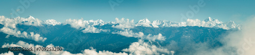 Aerial view of Himalayan mountain range seen from Nagarkot surrounded by clouds. The highest mountains in the world seen from Nepal.
 photo