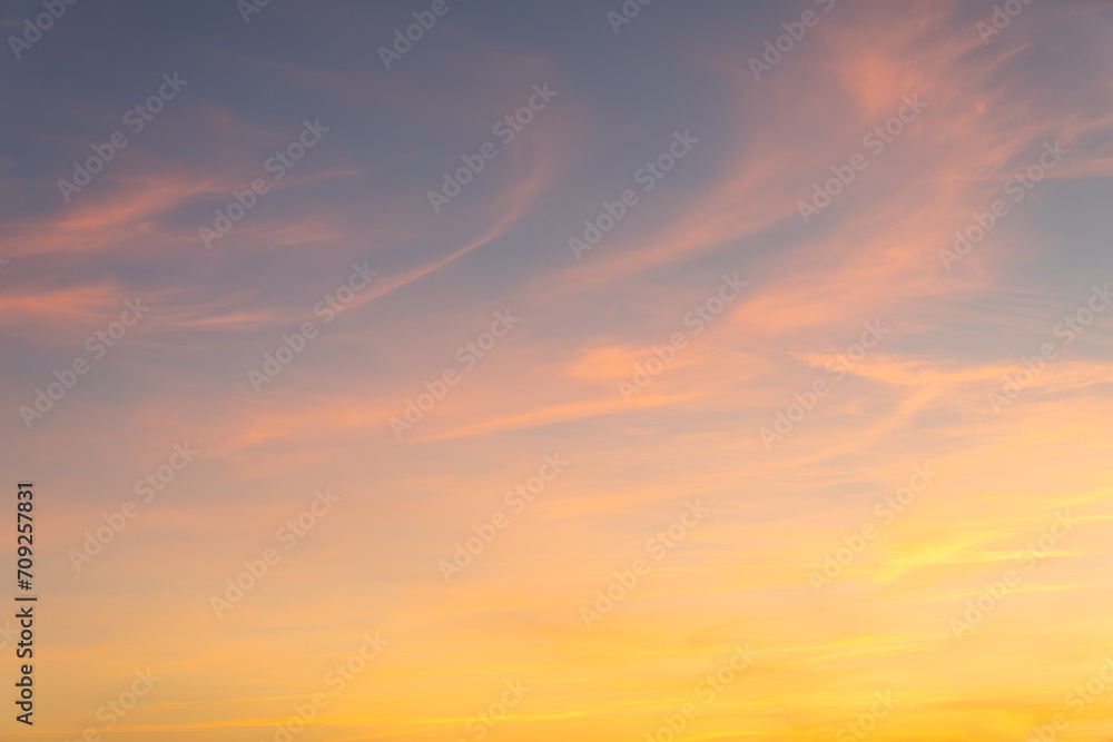View of colorful, pink blue and yellow colored evening sky without obstacles in the front. Ideal for sky replacement projects