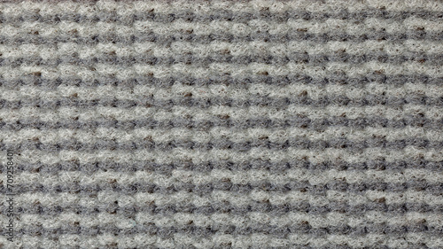 Close up of soft and warm grey fabric. Background for graphics