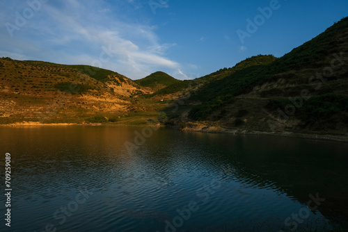 Lake of Vaqar, Albania county, Small lake, green grass.