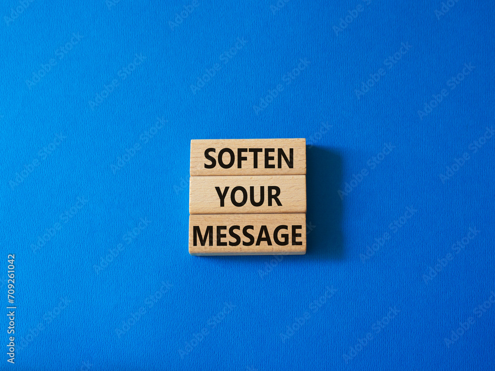 Soften your Message symbol. Concept words Soften your Message on wooden blocks. Beautiful blue background. Business concept. Copy space. Soften your Message symbol. Concept words Soften your Message on wooden blocks. Beautiful blue background. Business concept. Copy space.