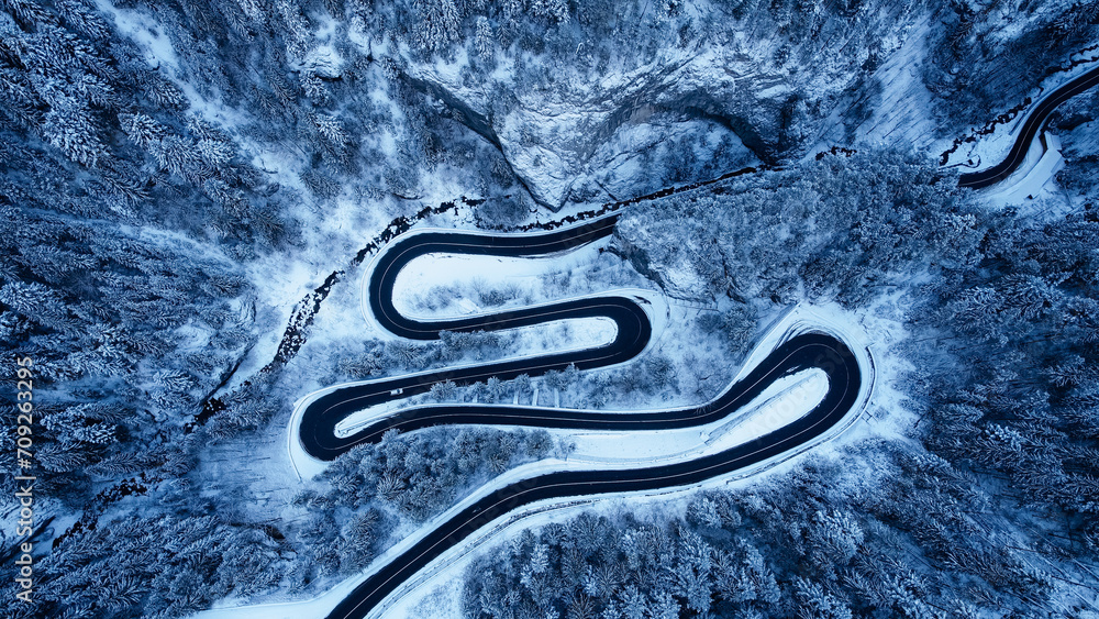 Top view of spectacular mountain road in winter.Serpentines from Romania mountains Fagaras. Top view of spectacular mountain road in winter.Serpentines from Romania mountains Fagaras.