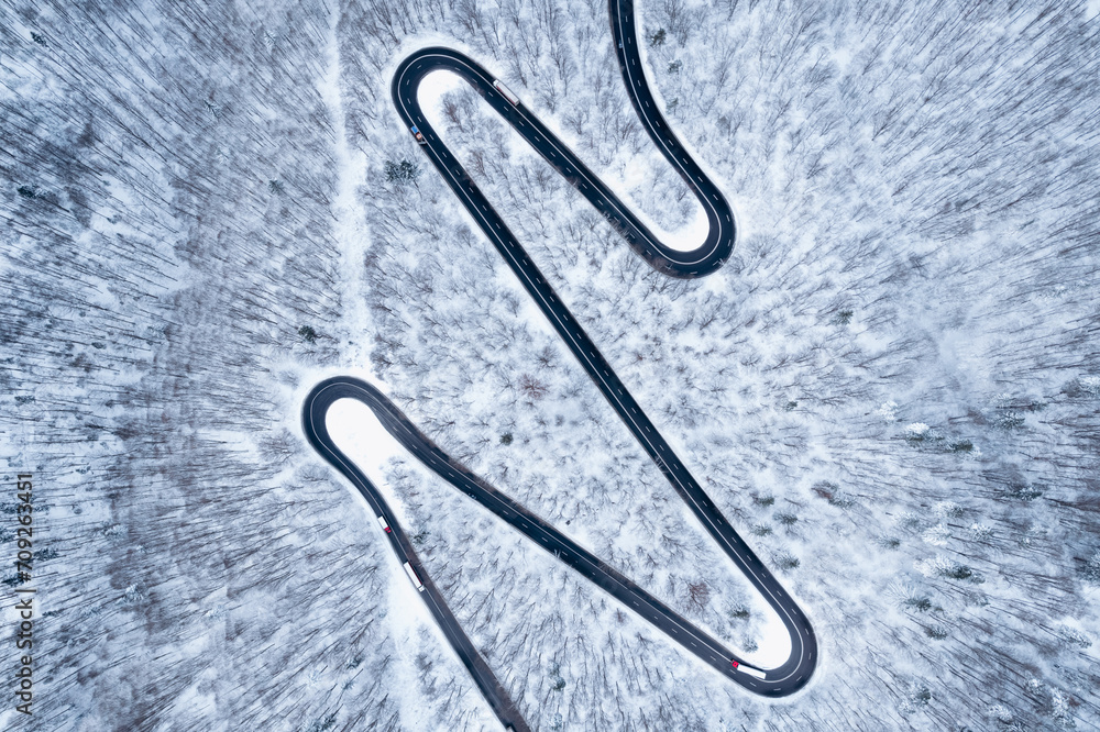 Fototapeta premium Aerial view of spectacular mountain road.Serpentines Romania.