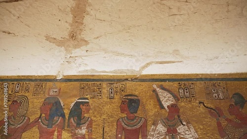 footage of Tomb of Tutankhamun KV62 Northern Wall Burial chamber in the valley of the kings west luxor Egypt. sculptural details on the wall of the temple of the Tutankhamun king. photo