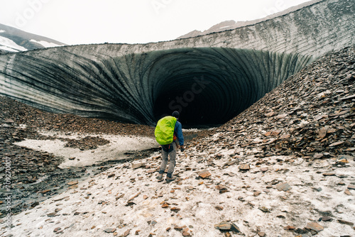 Rounded tunnel ice cave view from the inside. Cueva de Jimbo, Ushuaia, Tierra del Fuego photo