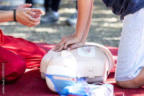 Obraz na płótnie CPR and first aid certification course using Automated External Defibrillator - AED